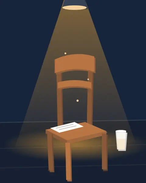 An empty chair under a spotlight on a stage